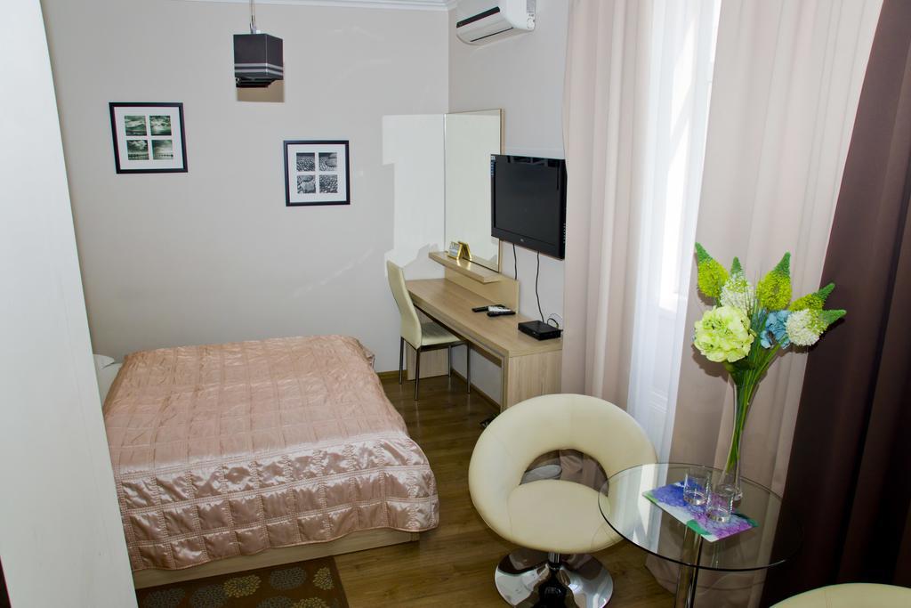 Hotel Merkuriy Lviv Rom bilde